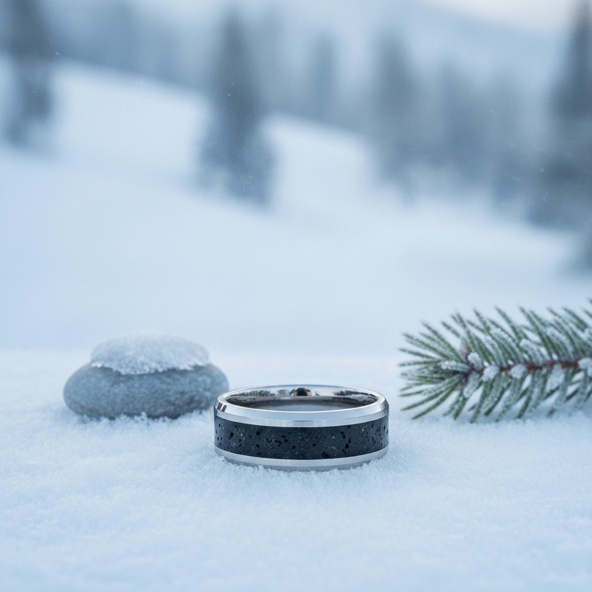 Aydins KILAUEA | Tungsten Carbide Ring, Lava Rock Inlay lifestyle scene, snowy pine