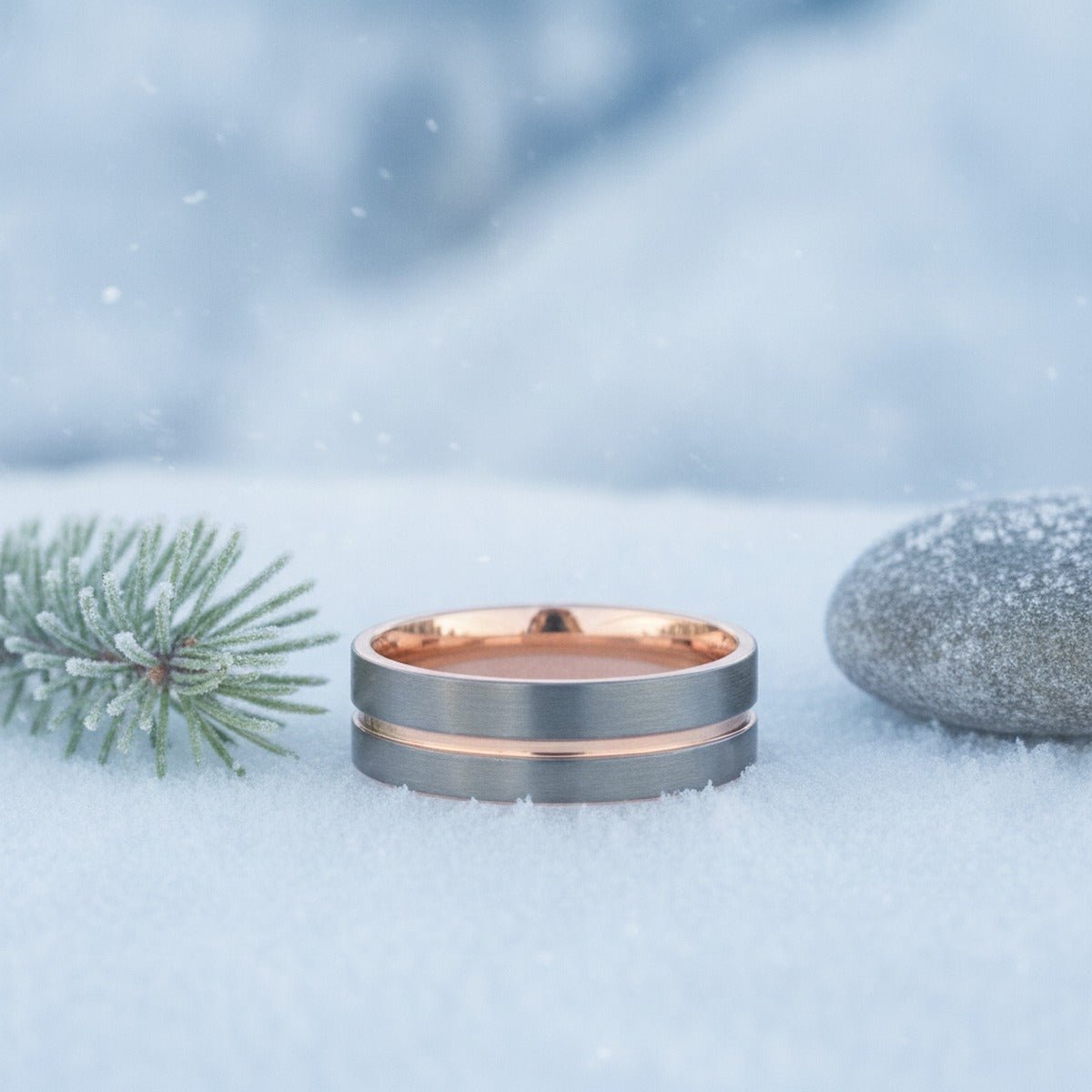 Aydins KORAI | Brushed Gunmetal Tungsten Rose Gold Groove Interior Flat Wedding Ring 8mm lifestyle scene, snowy pine