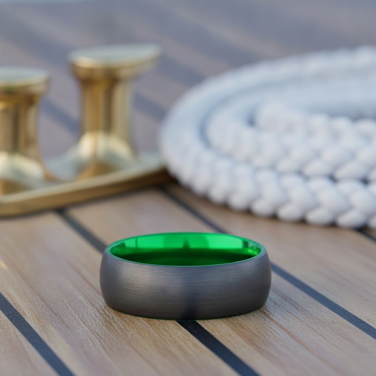Aydins LAMBO | Green Ring, Black Tungsten Ring, Brushed, Domed lifestyle scene, yacht teak deck