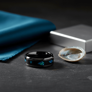 LUMINARIA — Editorial masculine still life — men's tungsten wedding ring.