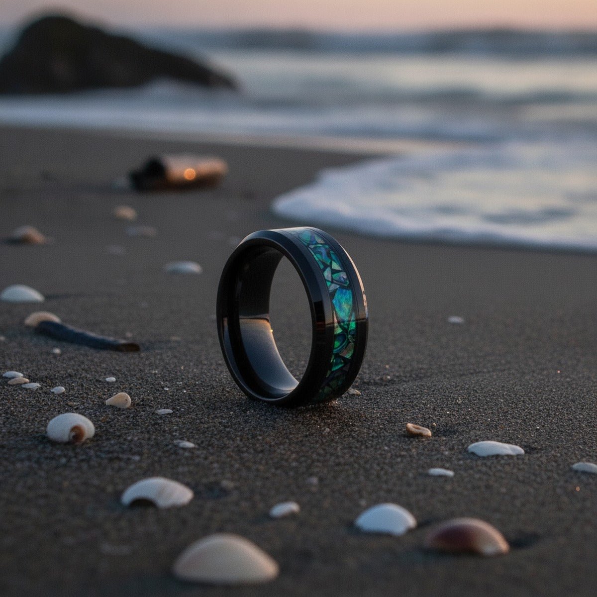 Aydins LUMINARIA | Polished Black Tungsten Abalone Shell Fragments Beveled Wedding Ring 8mm lifestyle scene, saltwater tide