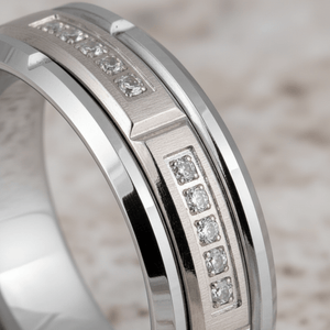 LUMORA — Extreme macro detail — men's tungsten wedding ring.