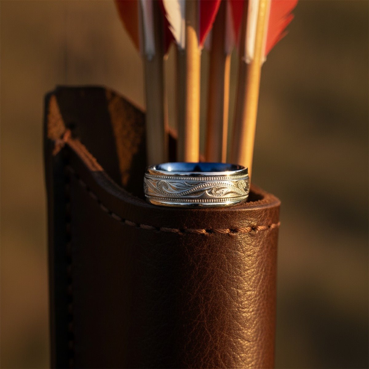 Aydins MARINER | Titanium Ring Blue Inside ilgrain Engraved lifestyle scene, archery quiver