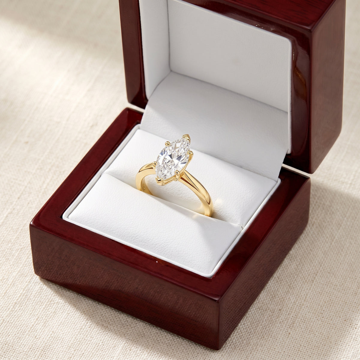 Marquise lab-grown diamond solitaire engagement ring, Yellow Gold, in cherry-wood ring box