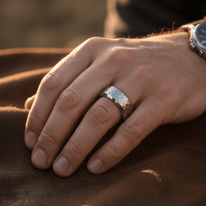 MATADOR — Lifestyle photo on hand — men's tungsten wedding ring.