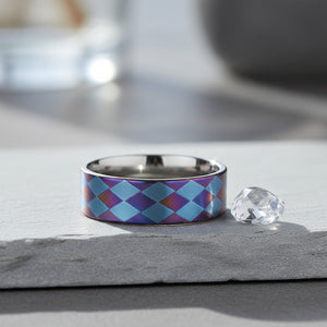 MERIDIAN flat titanium ring on slate stone with crystal, lifestyle scene