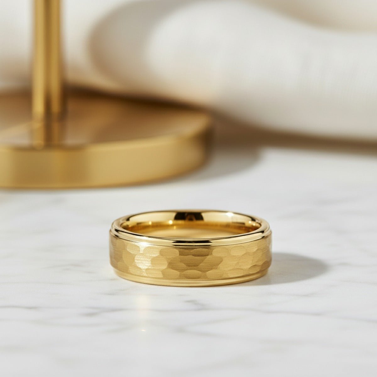 Aydins MONARCH | Yellow Tungsten Hammered Ring lifestyle scene, marble minimal