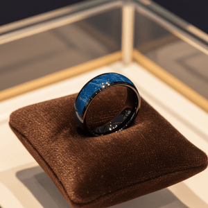 NASOS — Premium boutique display on velvet — men's tungsten wedding ring.