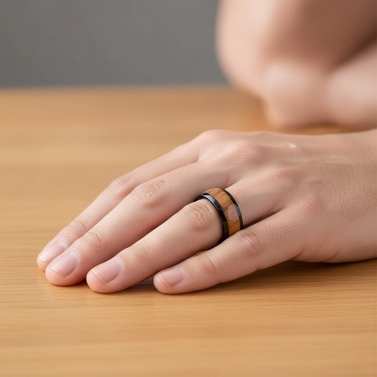 ODYSSEY black ceramic ring, hand lifestyle