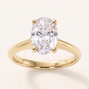 Oval lab-grown diamond solitaire engagement ring, Yellow Gold, face-on detail macro