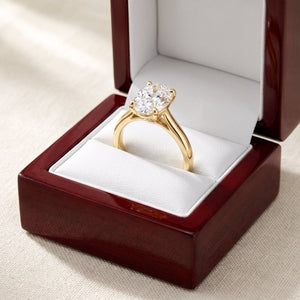 Oval lab-grown diamond solitaire engagement ring, Yellow Gold, in cherry-wood ring box
