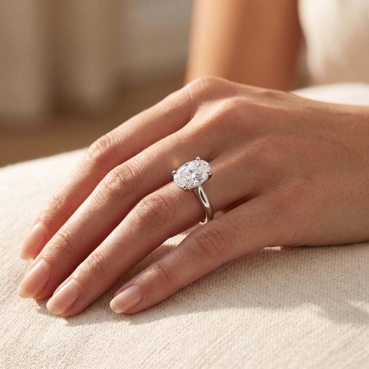 Oval lab-grown diamond solitaire engagement ring, 925 Sterling Silver, lifestyle photograph