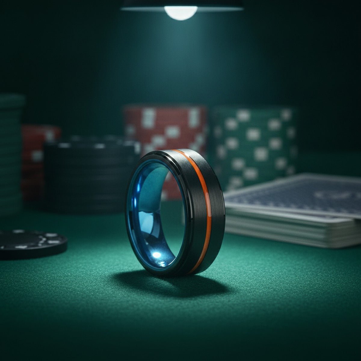 Aydins PEORIA | Blue Tungsten Ring, Black Tungsten Ring, Orange Groove, Stepped Edge lifestyle scene, poker felt
