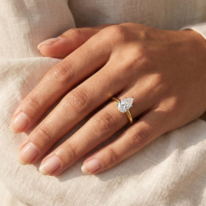 PIPPA pear lab-grown diamond ring in 14K two-tone gold, worn on the hand, approx. 1 ct center