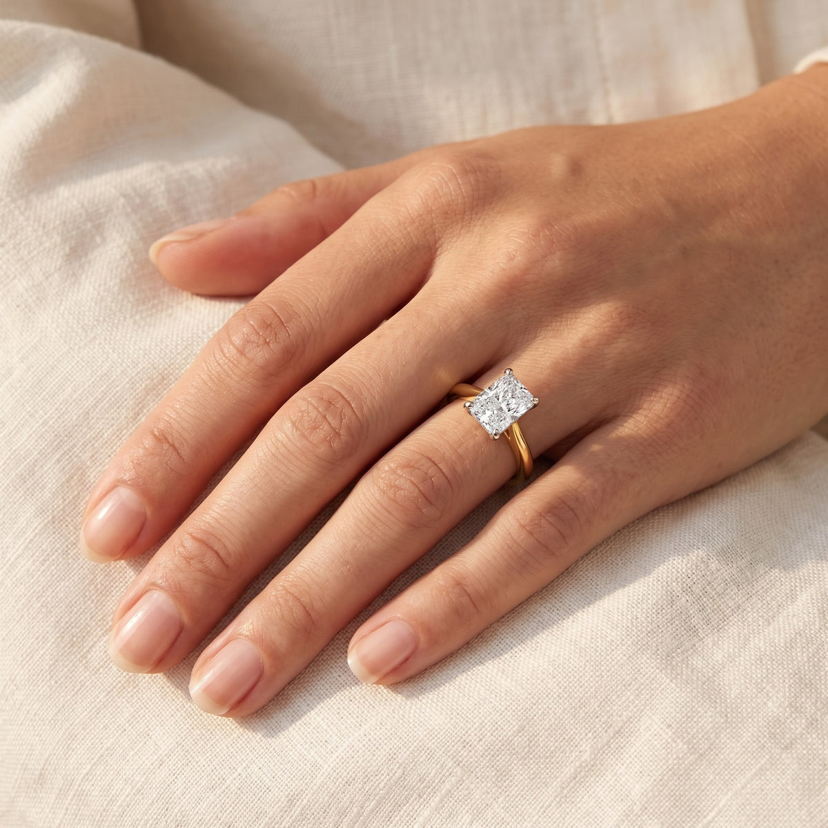 HELENA radiant lab-grown diamond ring in 14K two-tone gold, worn on the hand, approx. 1 ct center