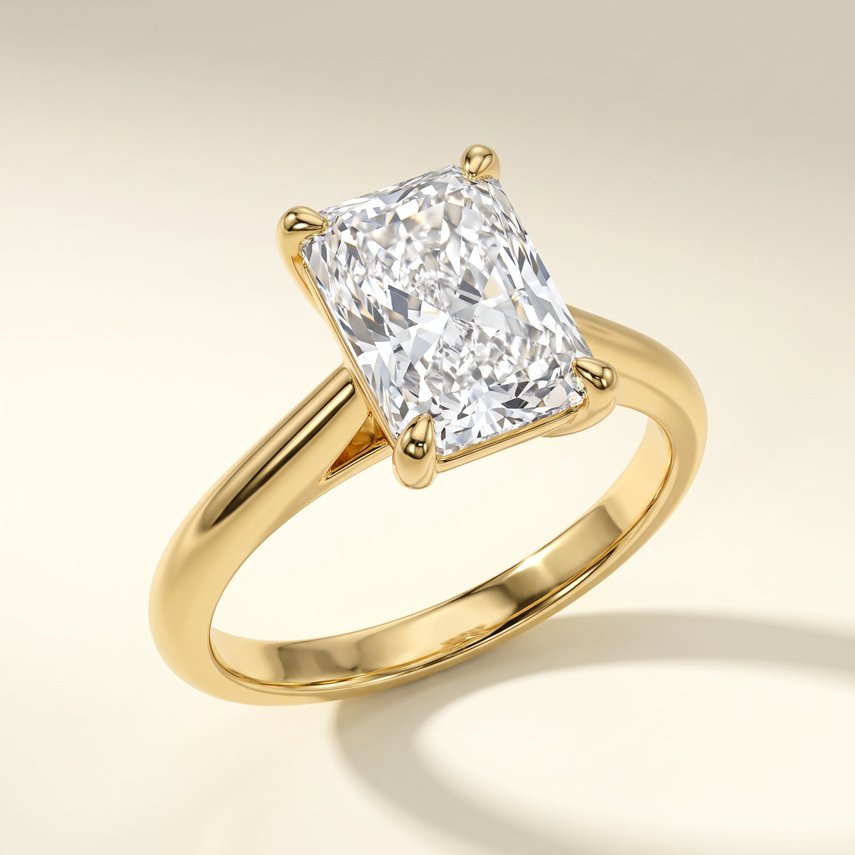 Radiant lab-grown diamond solitaire engagement ring, Yellow Gold, studio hero