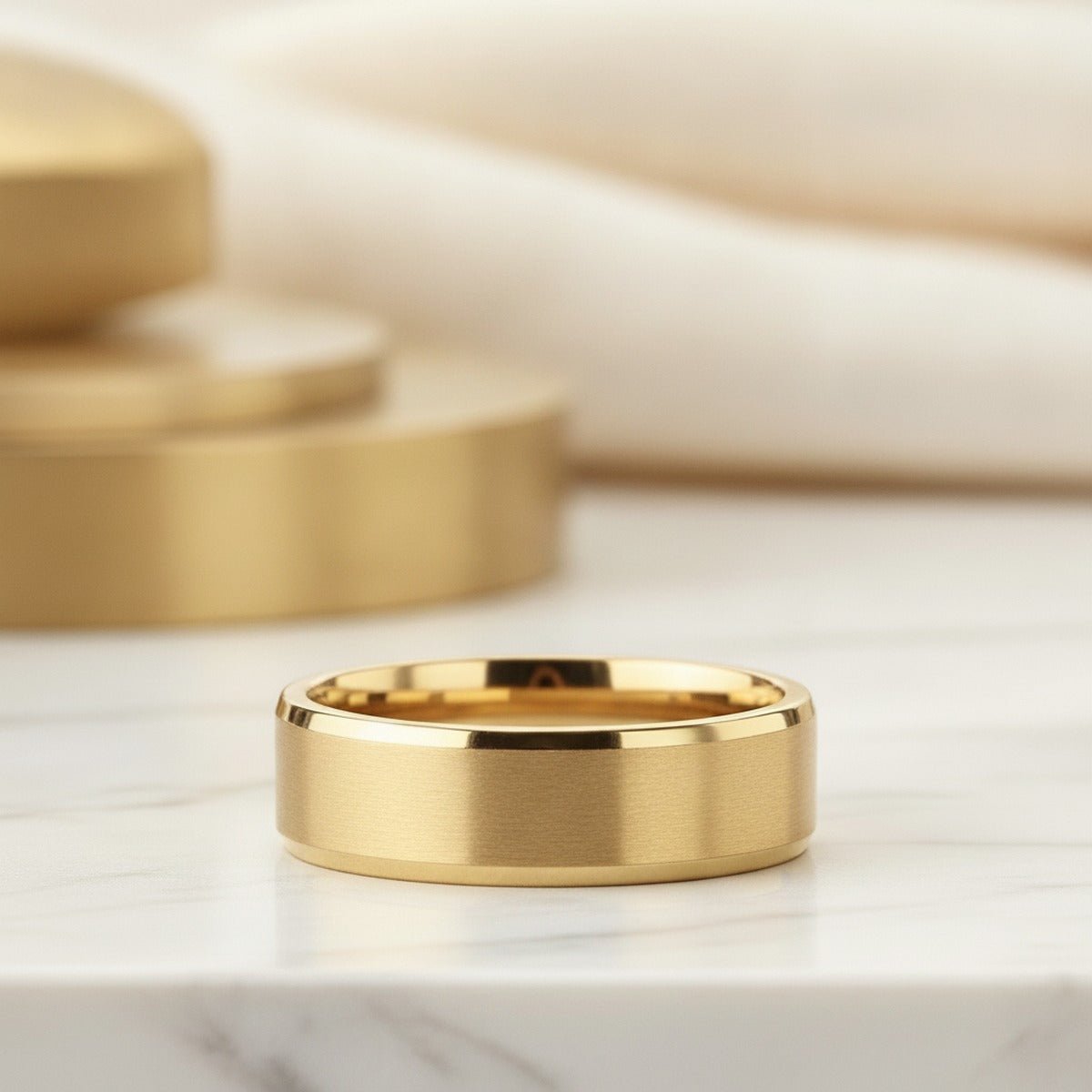 Aydins RADIATE | Gold-Plated Titanium Brushed Wedding Ring 8mm lifestyle scene, marble minimal
