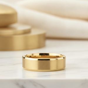 Aydins RADIATE | Gold-Plated Titanium Brushed Wedding Ring 8mm lifestyle scene, marble minimal