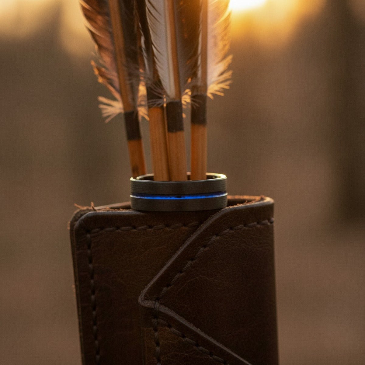 Aydins RAPTOR | Black Ring, Black Tungsten Ring, Blue Offset Groove, Flat lifestyle scene, archery quiver
