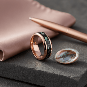 RESINOVA — Editorial masculine still life — men's tungsten wedding ring.