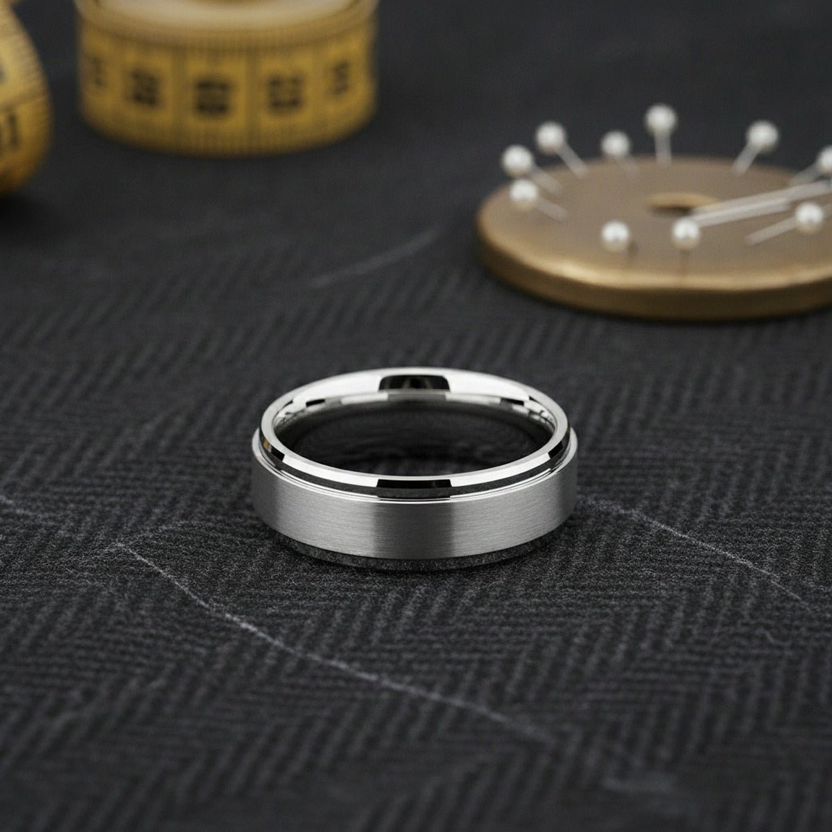 Aydins REVOLUTION | Silver Tungsten Fidget Spinner Wedding Ring — 8mm lifestyle scene, tailor shop