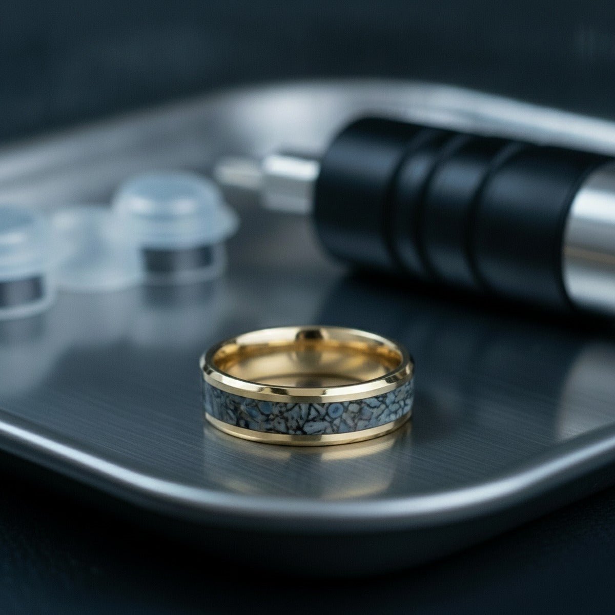 Aydins REXXAR | 14k Gold Dinosaur Inlay Wedding Ring - 8mm lifestyle scene, tattoo studio