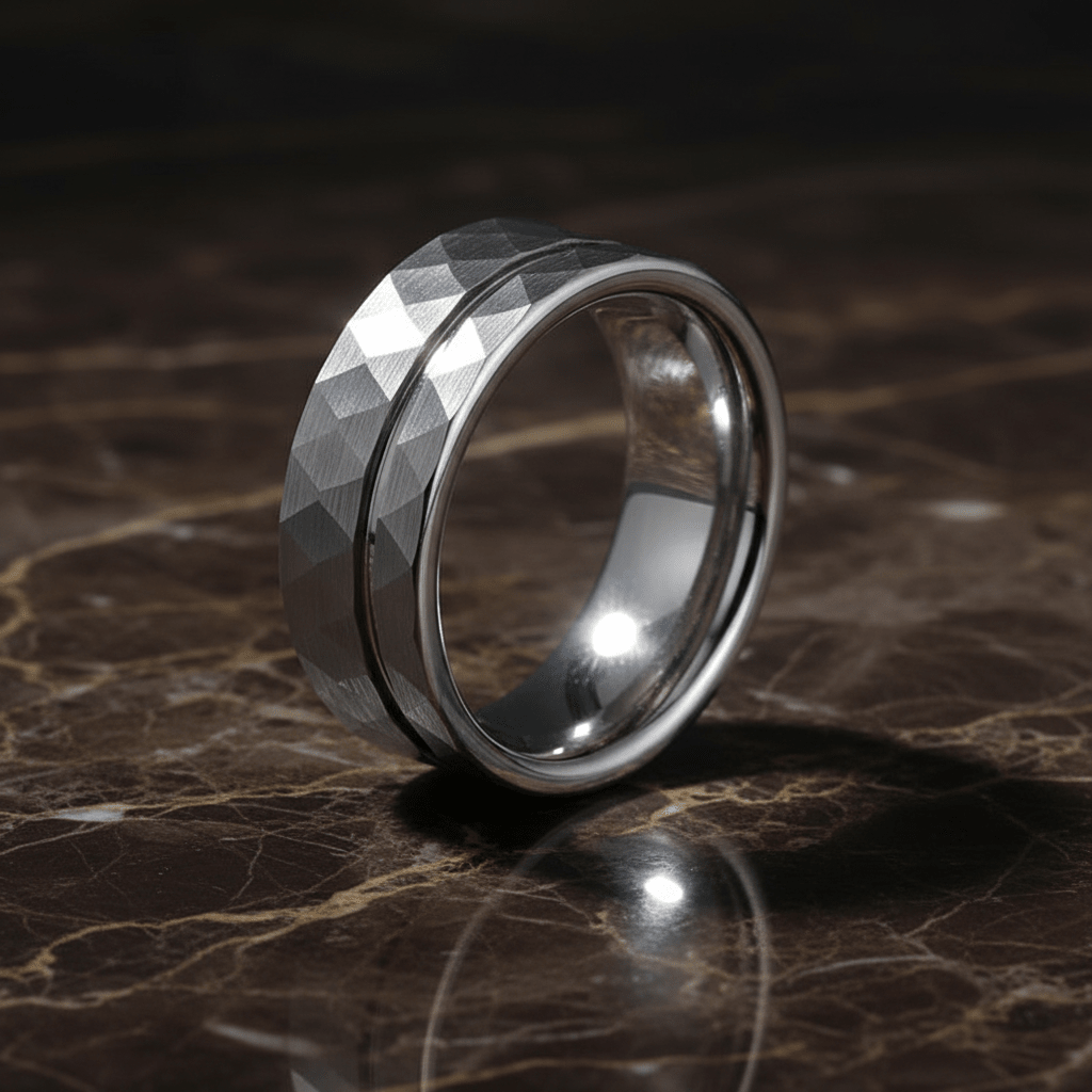 ROCCO — Luxury 3/4 angle on dark marble — men's tungsten wedding ring.
