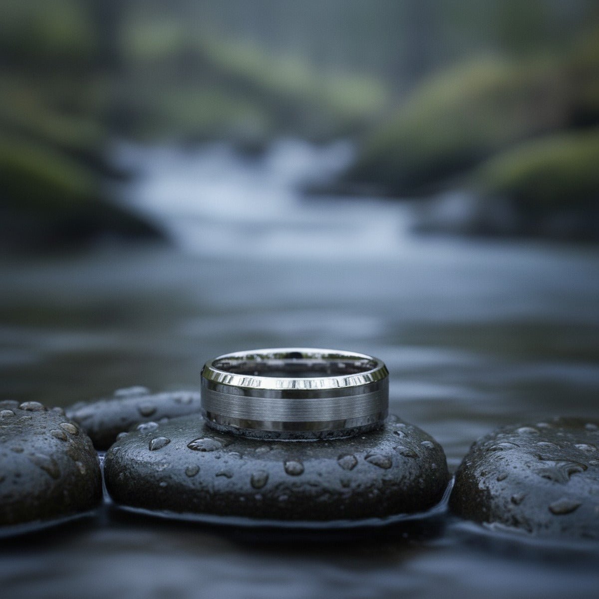 Aydins ROCK | Silver Tungsten Brushed Beveled Wedding Ring 8mm lifestyle scene, river stones