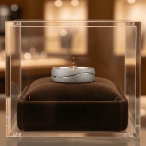 ROUGHZEN — Premium boutique display on velvet — men's tungsten wedding ring.
