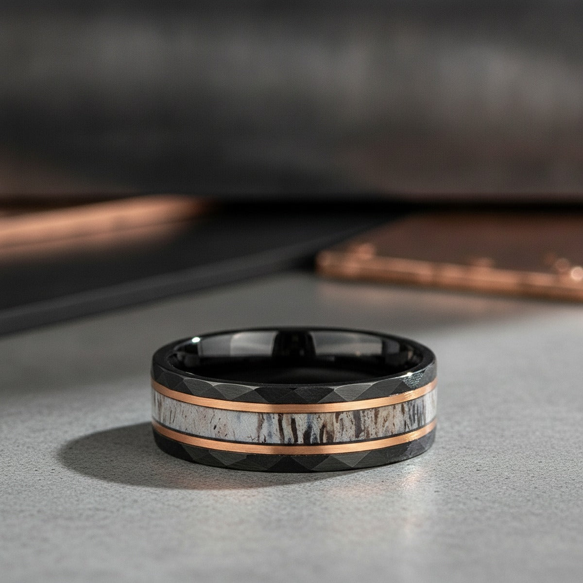 Aydins RUSTIC | Black Tungsten Ring, Deer Antler Inlay and Hammered Edges lifestyle scene, concrete industrial