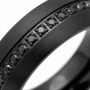 SANCHO — Extreme macro detail — men's tungsten wedding ring.