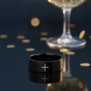 Aydins SANCTUS | Black Tungsten Minimalist Cross Wedding Band, Flat lifestyle scene, new year crystal
