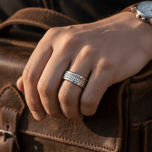 SILVERFANG — Lifestyle photo on hand — men's tungsten wedding ring.