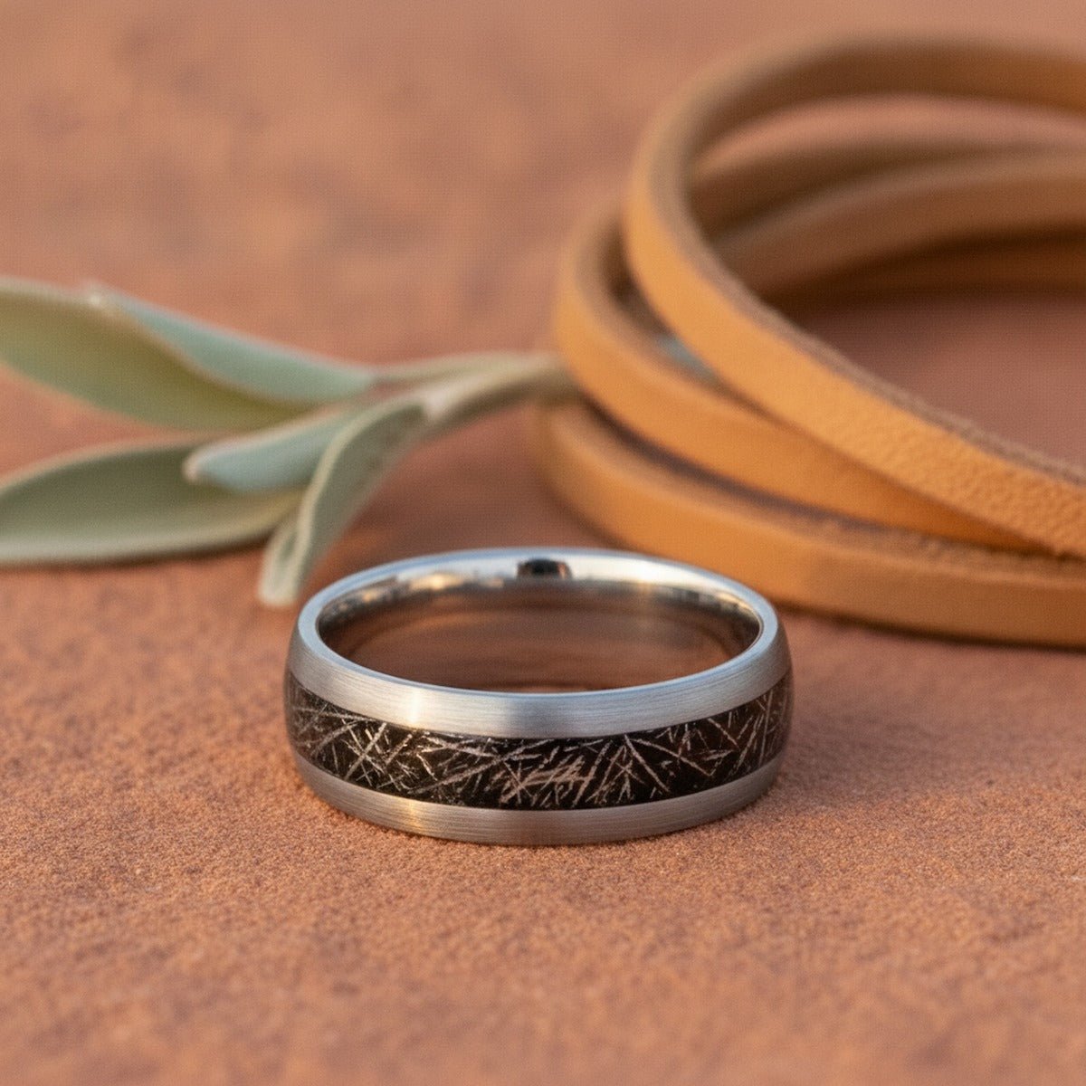 Aydins STARY | Silver Tungsten Meteorite Inlay Wedding Ring 8mm lifestyle scene, red canyon rock