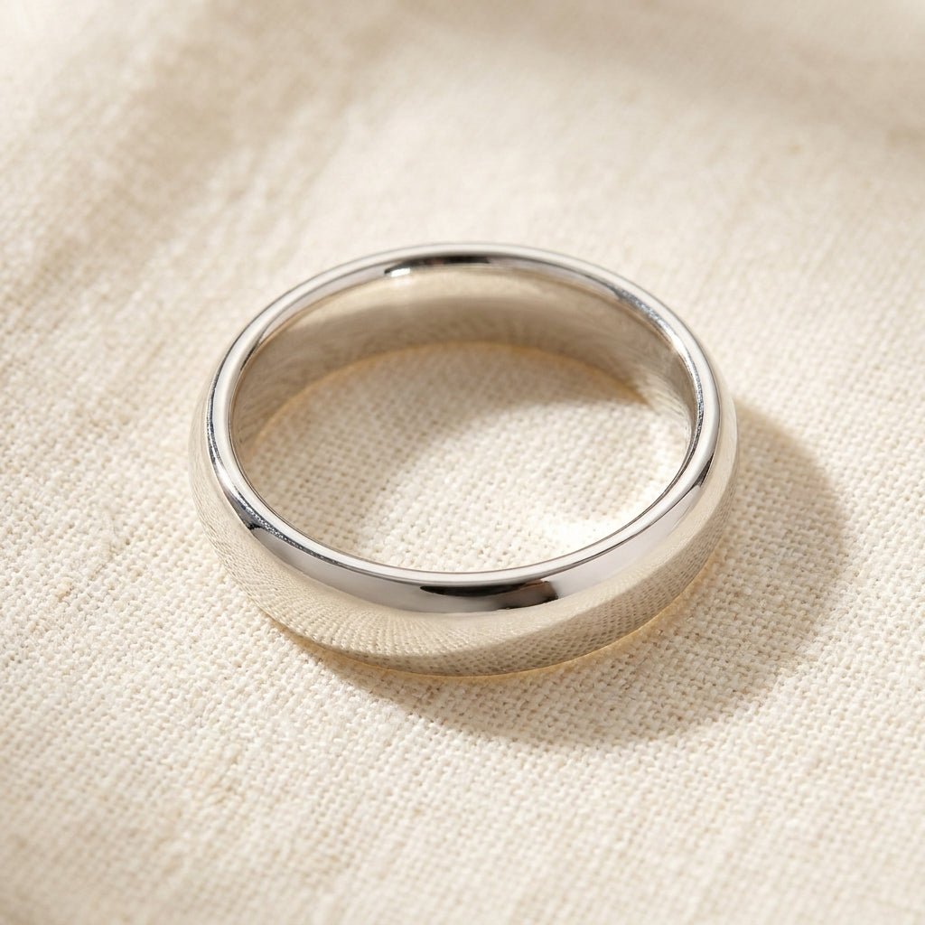 Sterling Silver Comfort Fit Wedding Band macro detail overhead flat lay
