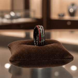 STRIDER — Premium boutique display on velvet — men's tungsten wedding ring.