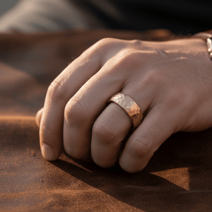 STRIKE — Lifestyle photo on hand — men's tungsten wedding ring.