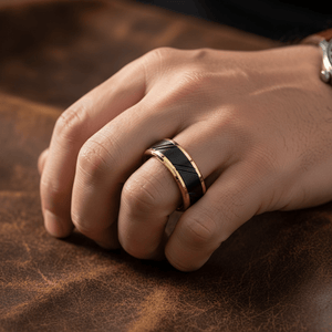 TALON — Lifestyle photo on hand — men's tungsten wedding ring.