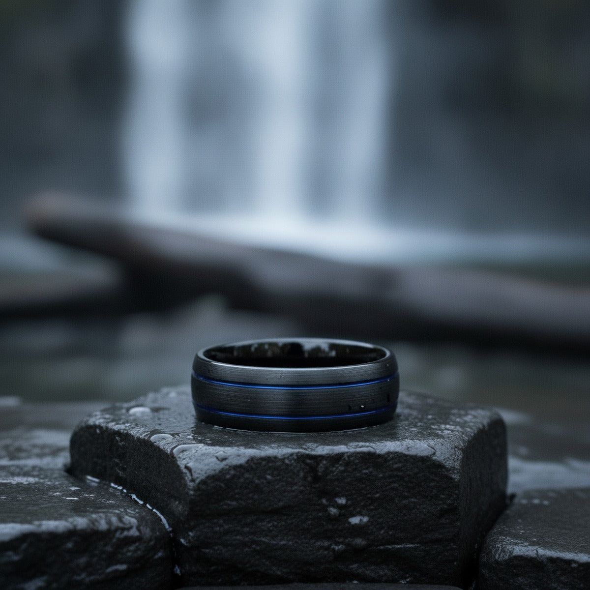 Aydins THEODORE | Black Tungsten Ring Two Blue Grooves lifestyle scene, waterfall basalt