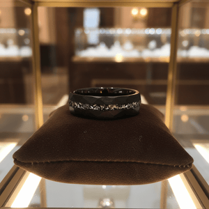 TITANIS — Premium boutique display on velvet — men's tungsten wedding ring.