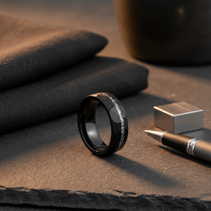 TITANIS — Editorial masculine still life — men's tungsten wedding ring.