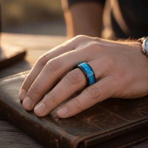 TRANQUIL — Lifestyle photo on hand — men's tungsten wedding ring.
