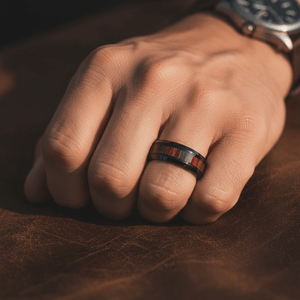 WARDEN — Lifestyle photo on hand — men's tungsten wedding ring.