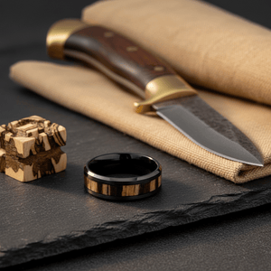 WILDSTRIPE — Editorial masculine still life — men's tungsten wedding ring.