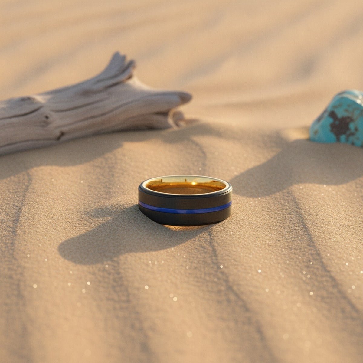 Aydins YASH | Gold Ring, Black Tungsten Ring, Blue Groove, Stepped Edge lifestyle scene, desert dune