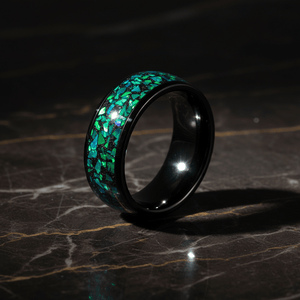 ZURLOU — Luxury 3/4 angle on dark marble — men's tungsten wedding ring.