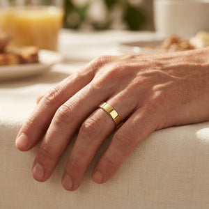10k Gold Flat Comfort Fit Wedding Band worn on hand, lifestyle photo