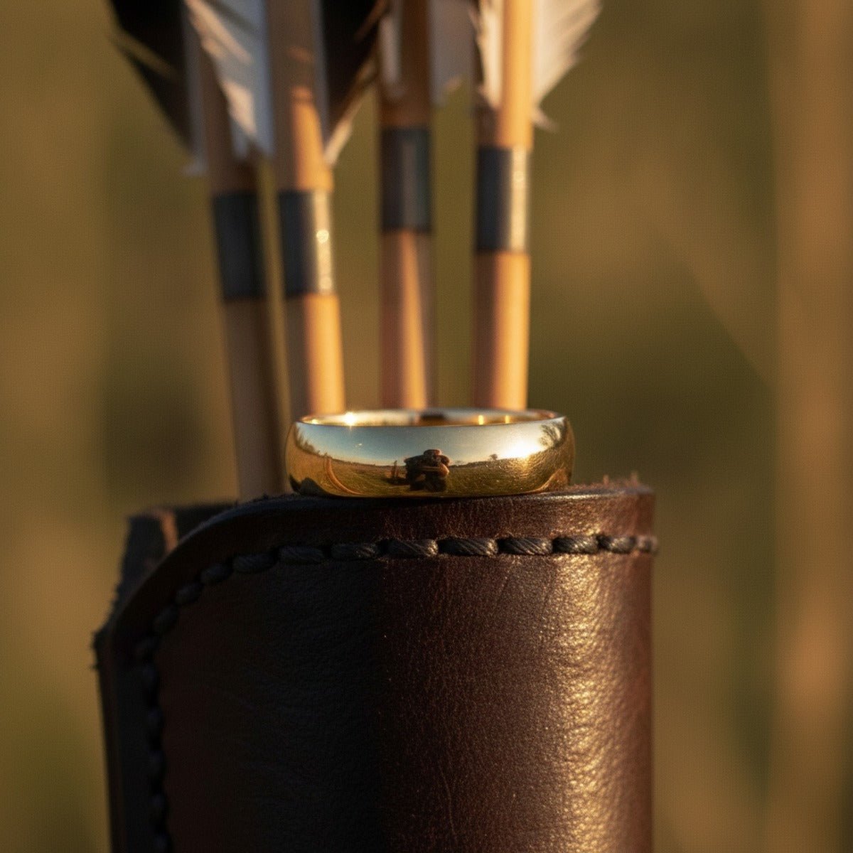 Aydins 14k Gold Comfort Fit Wedding Band, Yellow or White Gold lifestyle scene, archery quiver