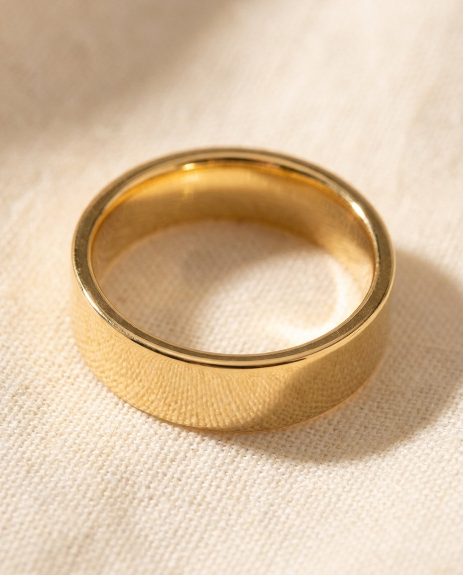 14k Gold Flat Comfort Fit Wedding Band macro detail overhead flat lay
