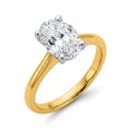 2 carat oval lab-grown diamond engagement ring in 14K two-tone gold with white prongs, top-down 3/4 beauty shot